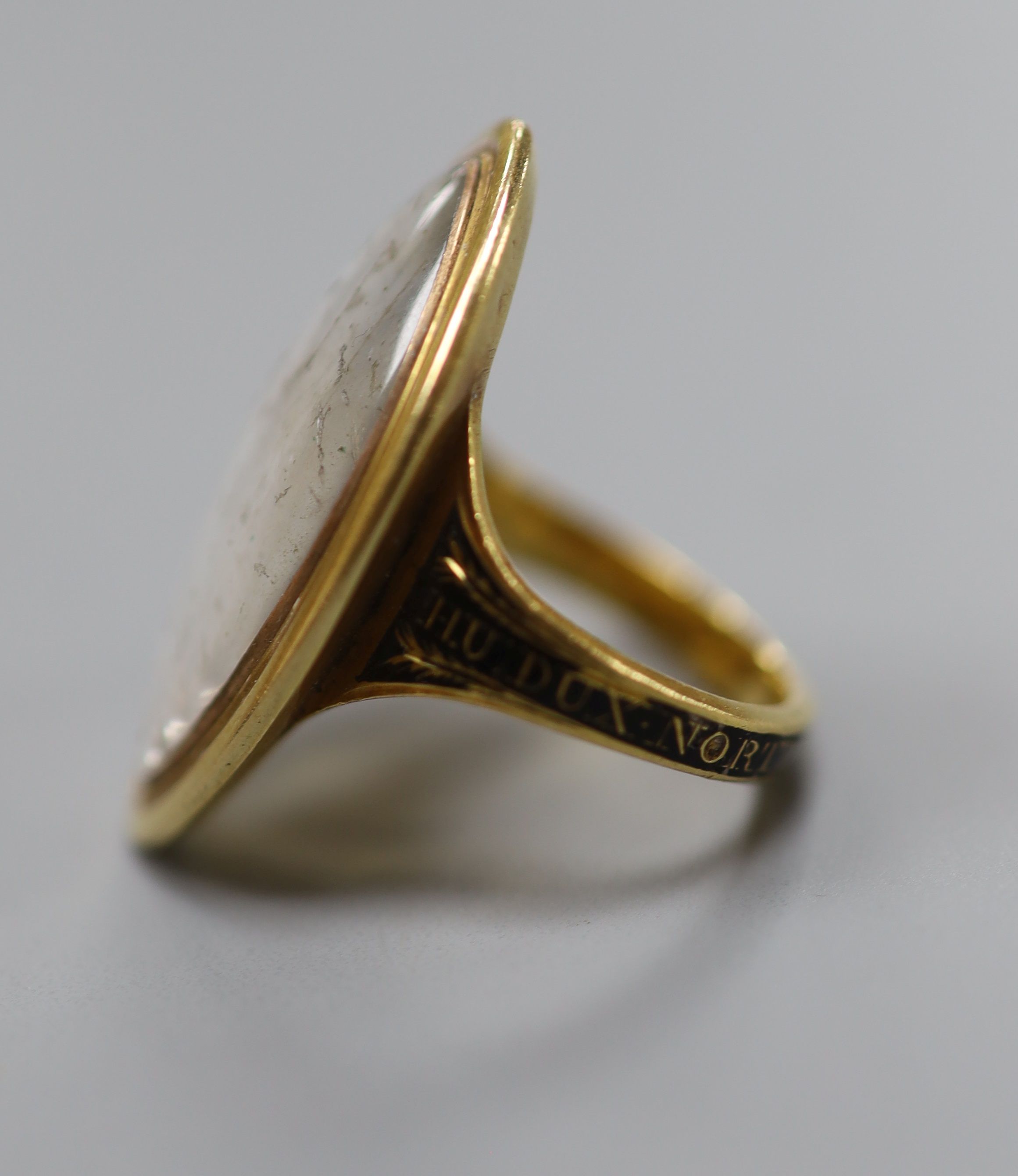 A George III yellow metal and three colour enamel navette shaped mourning ring, with Ducal coronet above 'N' on a pedestal with urn above, the shank with black enamel inscription which reads 'HU. DUX NORTHbr. OB 6 Jun. 1